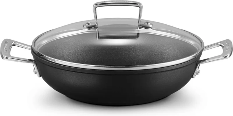 Hapjespan - Sauteuse - met deksel - Les Forgées TN5 - ø 24 cm / 2.3 liter - standaard anti-aanbaklaag by Le Creuset in Black – product photo