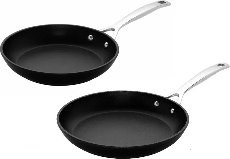 Koekenpannenset Les Forgées TNS - Ø 24 en 28 cm - Standaard Anti-aanbaklaag - Geschikt voor Alle Warmtebronnen, inclusief Inductie - Duurzaam en Vaatwasserbestendig fra Le Creuset i Sort – produktbillede