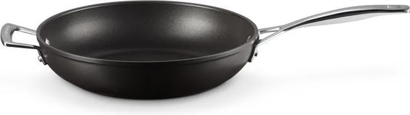 Sauteerpan Les Forgées TNS - ø 28 cm / 3.2 liter - standaard anti-aanbaklaag by Le Creuset in Black – product photo