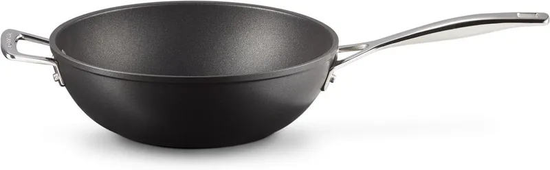 Wokpan met steel - Les Forgées TNS - ø 26 cm / 3.4 liter - standaard anti-aanbaklaag by Le Creuset in Black – product photo