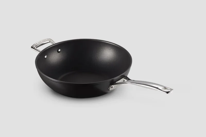Wokpan met steel - Les Forgées TNS - ø 30 cm / 4.7 liter - standaard anti-aanbaklaag by Le Creuset in Black – product photo 1 of 3